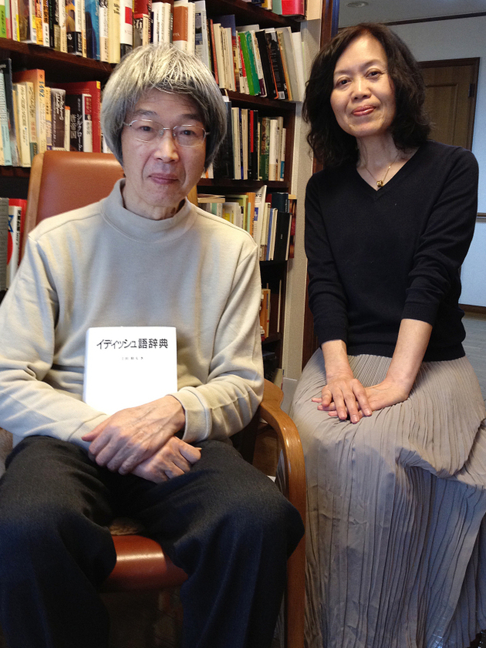 Japanese linguist Kazuo Ueda (left) worked 20 years on a 1,300-page, 28,000-entry Idishugo Jiten, or Yiddish-Japanese dictionary. He is shown here with his wife, Kazuko, at their home in Kyushu, Japan. 