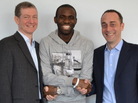 Fabrice Muamba, center, with cardiologist Dr. Andrew Deaner (left) and cardiologist Dr. Sam Mohiddin (right), before his release from the London Chest Hospital today. Fabrice Muamba, center, with cardiologist Dr. Andrew Deaner (left) and cardiologist Dr. Sam Mohiddin (right), before his release from the London Chest Hospital today.