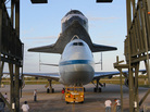 The space shuttle Discovery is loaded onto the back of a modified 747 at Kennedy Space Center on April 15. The plane will ferry the shuttle to Washington, D.C., on April 17, where it will be permanently installed at the Smithsonian National Air and Space Museum. The space shuttle Discovery is loaded onto the back of a modified 747 at Kennedy Space Center on April 15. The plane will ferry the shuttle to Washington, D.C., on April 17, where it will be permanently installed at the Smithsonian National Air and Space Museum.