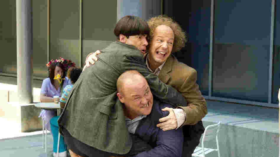 After they leave their orphanage for the first time, Curly (Will Sasso) bears a heavy burden — his fellow Stooges, Moe (Chris Diamantopoulos, left) and Larry (Sean Hayes).
