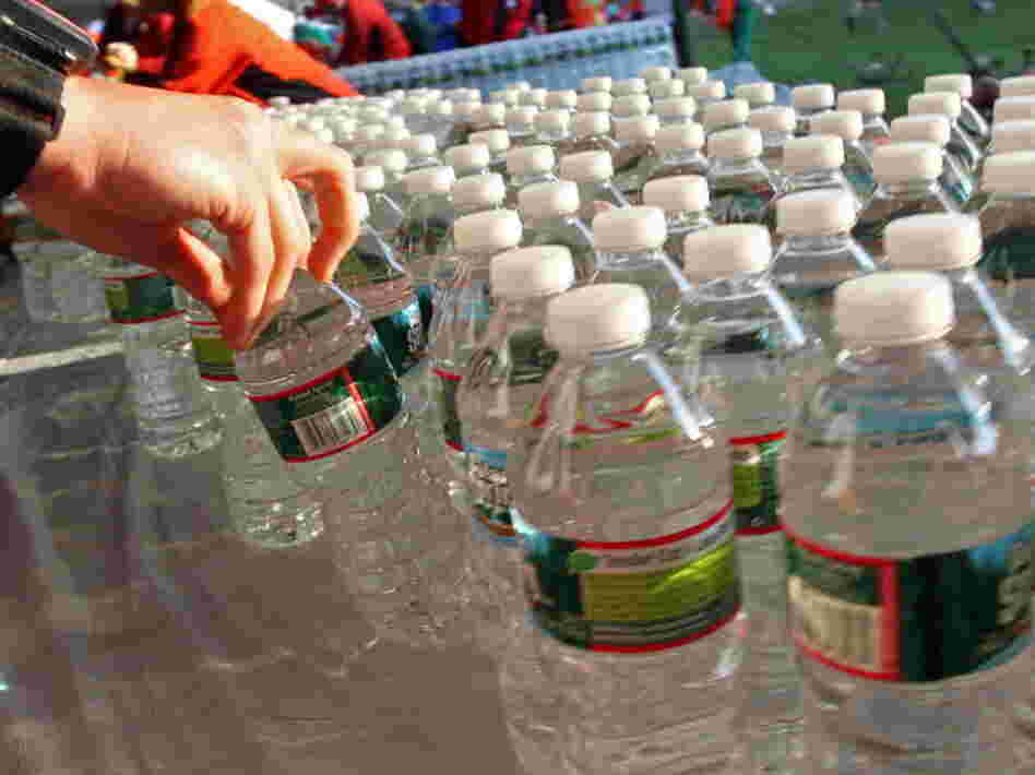 Before the start of the Boston Marathon this morning, a runner grabbed a bottle of water from among the hundreds lined up on a table in Hopkinton, Mass.