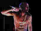 A digital image of Tupac Shakur is seen performing at the Coachella Festival.