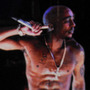 A digital image of Tupac Shakur is seen performing at the Coachella Festival.