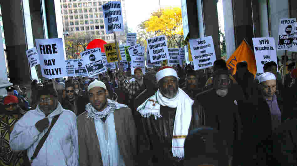 Muslim community members and supporters march near 1 Police Plaza to protest the New York Police Department surveillance operations of Muslim communities, Friday, Nov. 18, 2011, in New York. Muslim community members and supporters march near 1 Police Plaza to protest the New York Police Department surveillance operations of Muslim communities, Friday, Nov. 18, 2011, in New York.