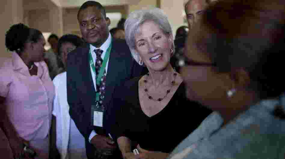 U.S. Secretary of Health and Human Services Kathleen Sebelius (center) talks to a health worker during a visit to Eliazar Germain hospital in Port-au-Prince, Haiti, on Monday. It's Sebelius' first visit to the country. U.S. Secretary of Health and Human Services Kathleen Sebelius (center) talks to a health worker during a visit to Eliazar Germain hospital in Port-au-Prince, Haiti, on Monday. It's Sebelius' first visit to the country.