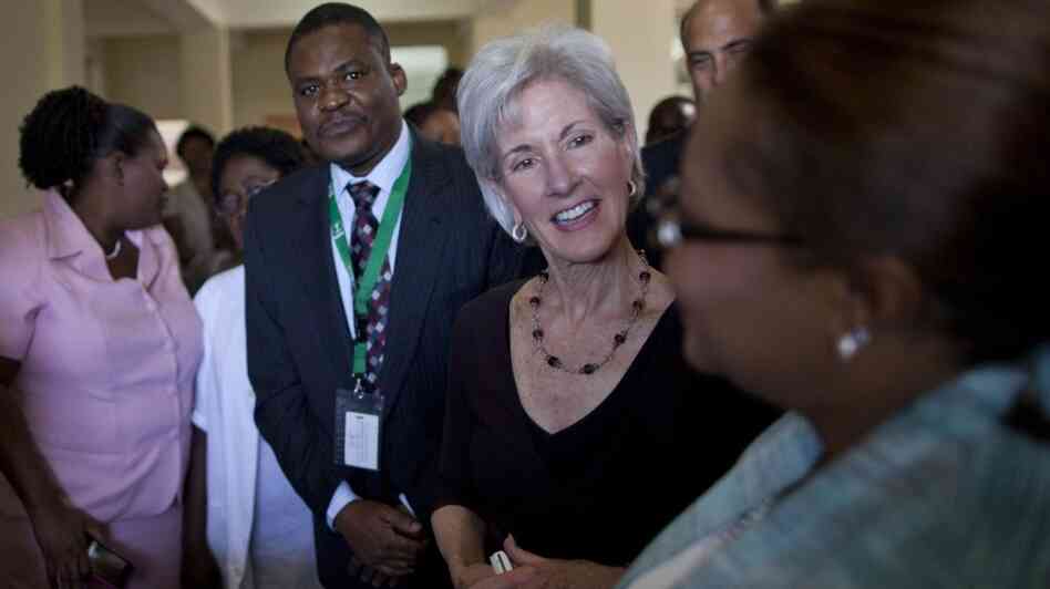 U.S. Secretary of Health and Human Services Kathleen Sebelius (center) talks to a health worker during a visit to Eliazar Germain hospital in Port-au-Prince, Haiti, on Monday. It's Sebelius' first visit to the country. U.S. Secretary of Health and Human Services Kathleen Sebelius (center) talks to a health worker during a visit to Eliazar Germain hospital in Port-au-Prince, Haiti, on Monday. It's Sebelius' first visit to the country.