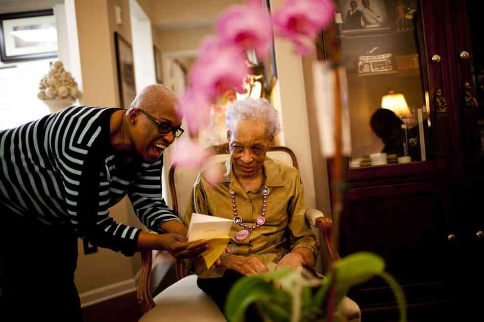 Geneva Hunter (left), who runs the secretarial operations for a Washington, D.C., law firm, decided to take a hands-on approach to her mother's care and moved Ida Christian, 89, into her home.