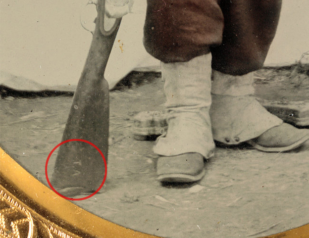 A closer view of the inscribed initials.