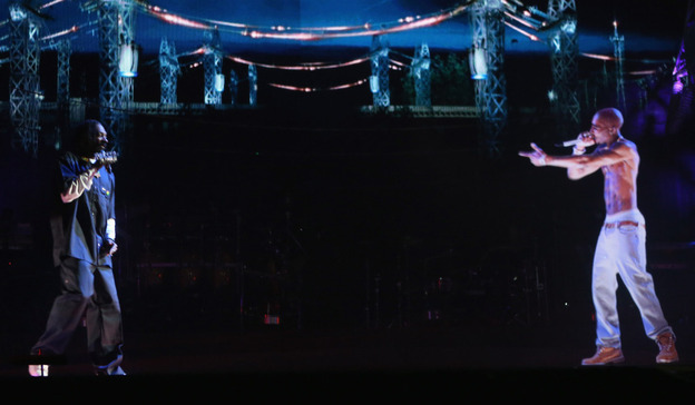 Near the end of his headlining set at the 2012 Coachella Valley Music & Arts festival, Snoop Dogg (left) performed next to a hologram of the deceased Tupac Shakur.