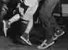Baseball-booted students jitterbugging at the Carrere night club in Paris. (Photo dated 1949)