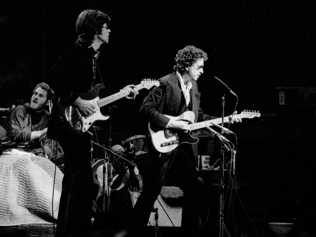 From left to right, Levon Helm, Robbie Robertson and Bob Dylan onstage at Madison Square Garden in 1974.