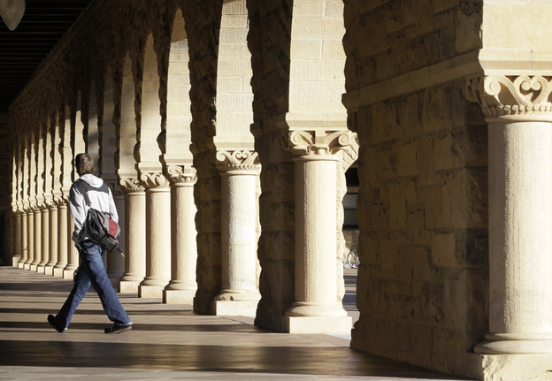 About 7 out of 10 students borrow money to pay for college. Here, a Stanford University student walks through the campus in Palo Alto, Calif. About 7 out of 10 students borrow money to pay for college. Here, a Stanford University student walks through the campus in Palo Alto, Calif.