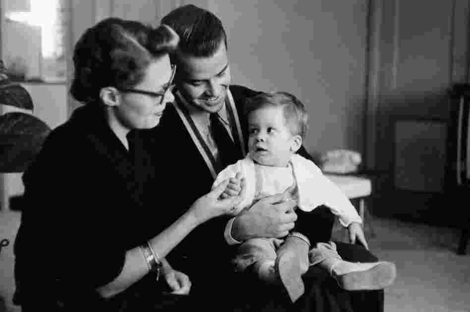 Clark and his first wife, Barbara, get a hand from the newest member of the Bandstand family, Richard Clark Jr., in 1958. 