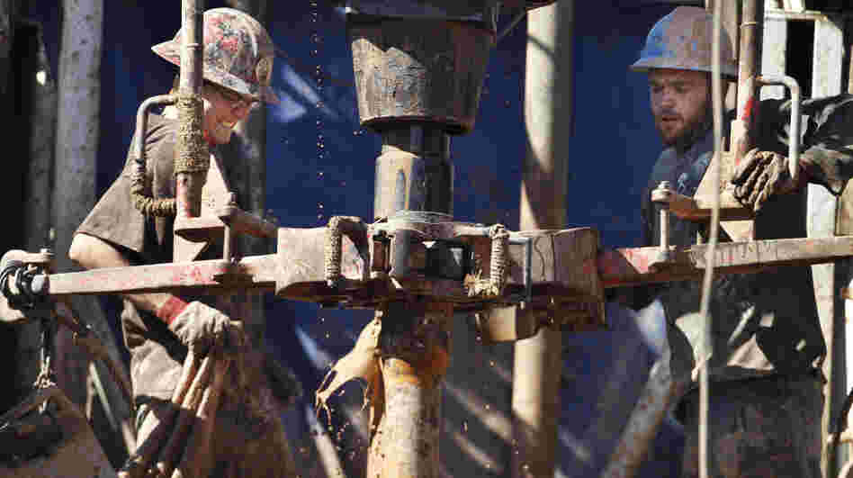 Oil field workers drill into the Gypsum Hills near Medicine Lodge, Kan., on Feb. 21. The Environmental Protection Agency announced new rules Wednesday to control the problem of air pollution coming from wells being drilled by the booming oil and natural gas drilling industry. Oil field workers drill into the Gypsum Hills near Medicine Lodge, Kan., on Feb. 21. The Environmental Protection Agency announced new rules Wednesday to control the problem of air pollution coming from wells being drilled by the booming oil and natural gas drilling industry.