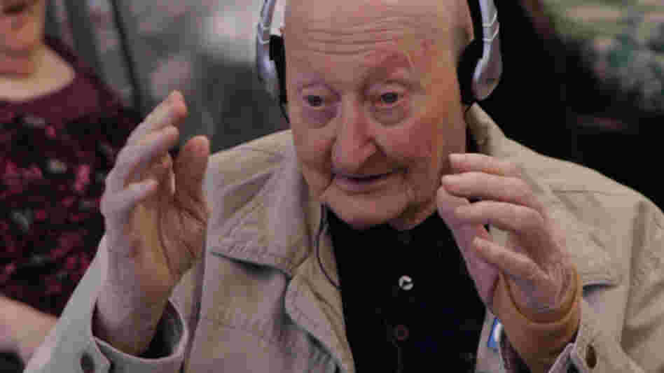 Joe, a nursing home resident, broke into song during a personalized music session. His story and others are documented in the film Alive Inside.