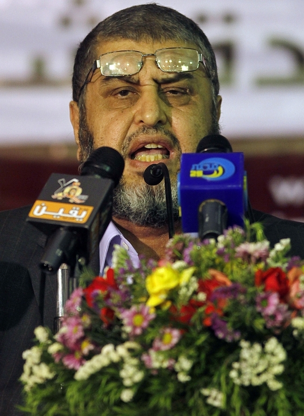 Egypt's Muslim Brotherhood presidential candidate Khairat el-Shater talks to reporters in Cairo on Tuesday. The elections commission has disqualified 10 presidential hopefuls, including el-Shater.