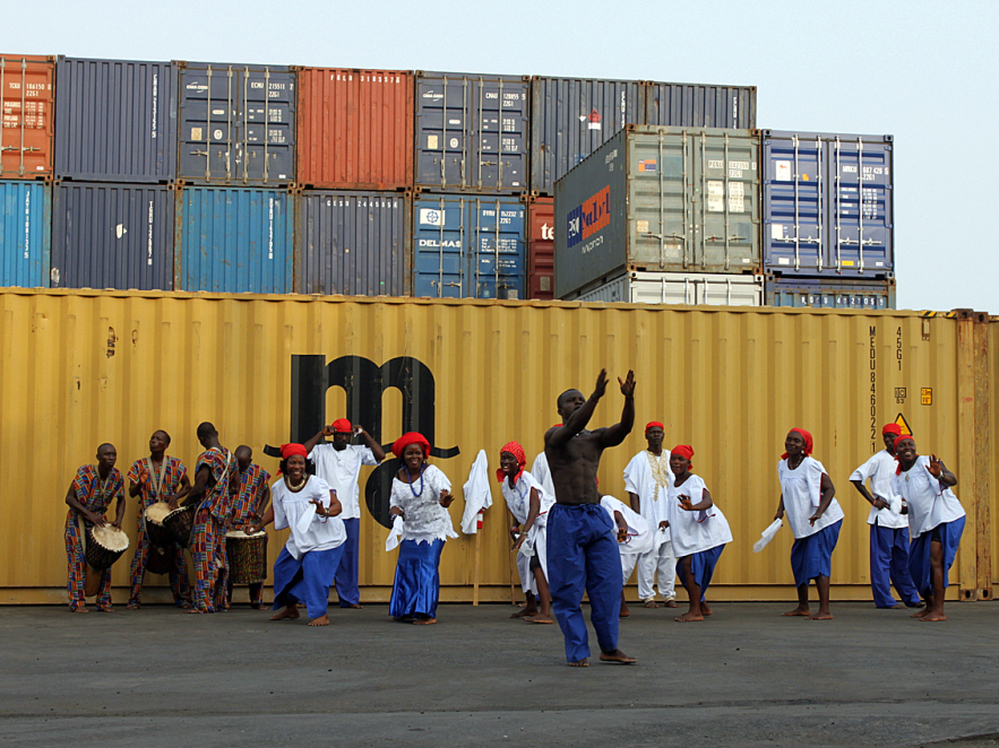 A cultural troupe dances for tourists arriving on the National Geographic Explorer in Monrovia, Liberia, this week.
