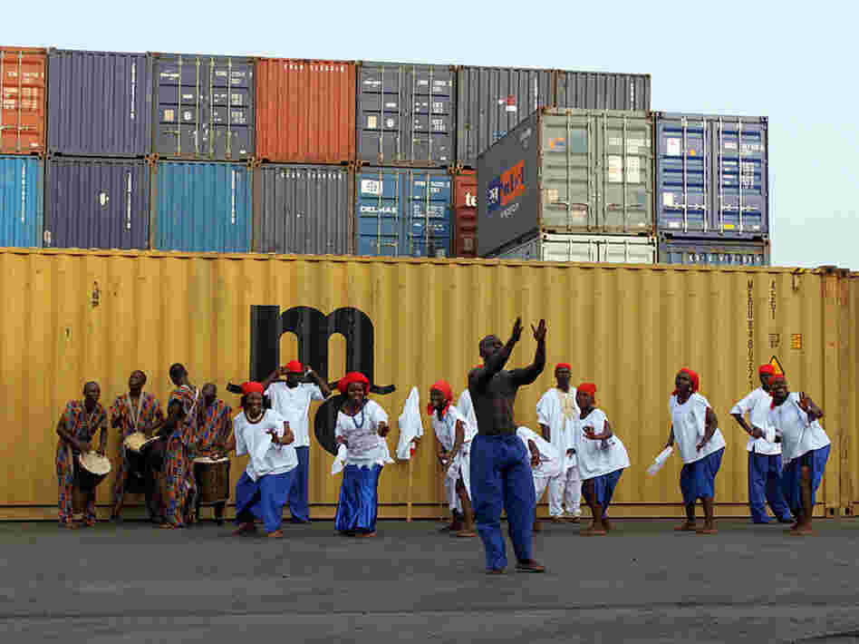 A cultural troupe dances for tourists arriving on the National Geographic Explorer in Monrovia, Liberia, this week.