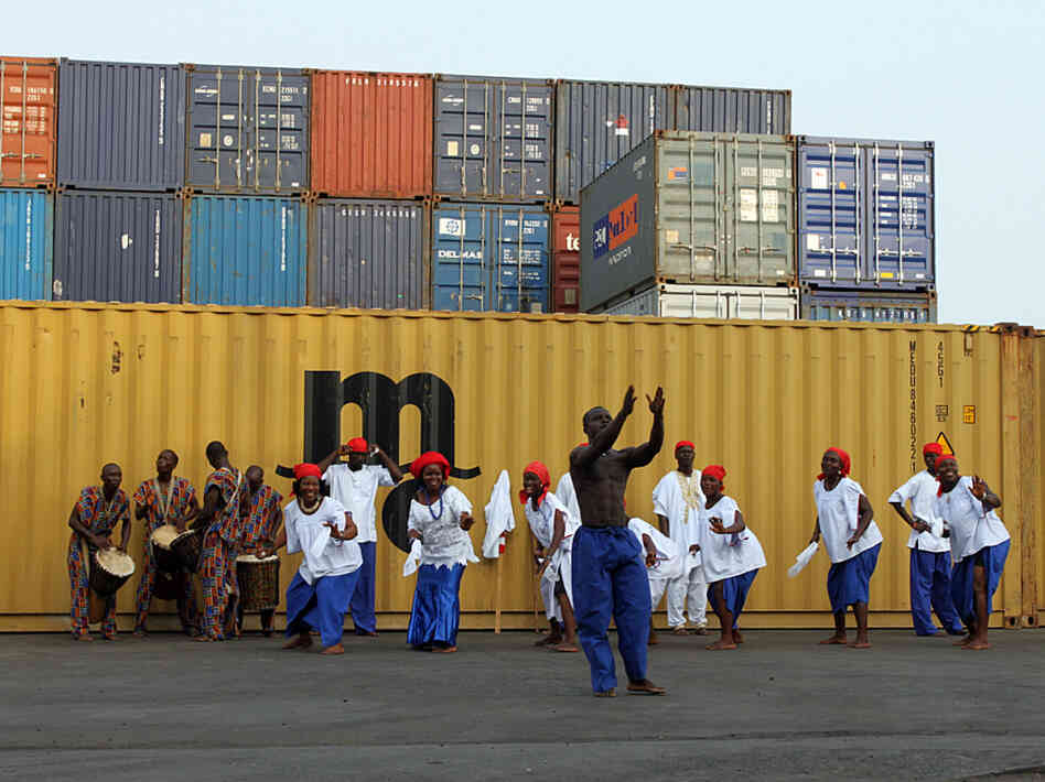 A cultural troupe dances for tourists arriving on the National Geographic Explorer in Monrovia, Liberia, this week.