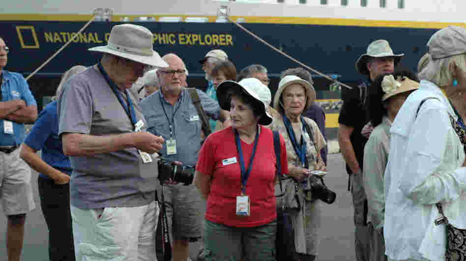 The 150 passengers aboard the National Geographic Explorer cruise ship arrive in Monrovia, the Liberian capital, on April 16. It's reportedly the largest group of tourists to visit the country since the 1970s. The 150 passengers aboard the National Geographic Explorer cruise ship arrive in Monrovia, the Liberian capital, on April 16. It's reportedly the largest group of tourists to visit the country since the 1970s.