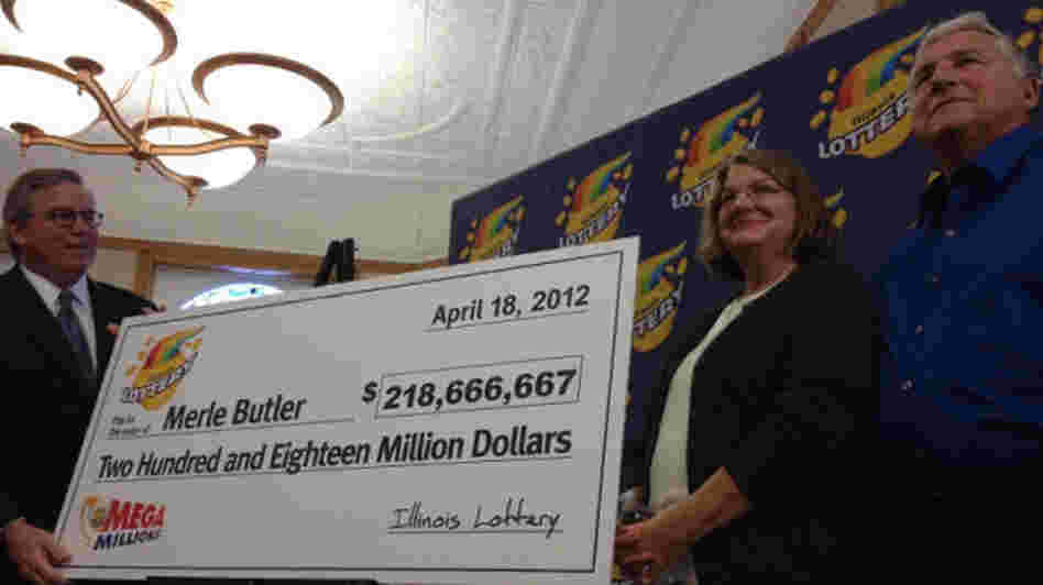 Merle and Patricia Butler (at right) accepting their ceremonial check earlier today.