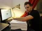 Many Web users have little idea about how, or when, they're being tracked. In this 2011 photo, Max Schrems of Austria sits with 1,222 pages about his activities on Facebook — the company gave him the file after he requested it under European law. Many Web users have little idea about how, or when, they're being tracked. In this 2011 photo, Max Schrems of Austria sits with 1,222 pages about his activities on Facebook — the company gave him the file after he requested it under European law.