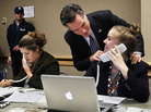 Republican presidential candidate Mitt Romney speaks with a staffer on the night of the Florida primary in January. Now that he's pivoting away from the primaries to the general election, Romney is expected to quadruple his staff soon. Republican presidential candidate Mitt Romney speaks with a staffer on the night of the Florida primary in January. Now that he's pivoting away from the primaries to the general election, Romney is expected to quadruple his staff soon.