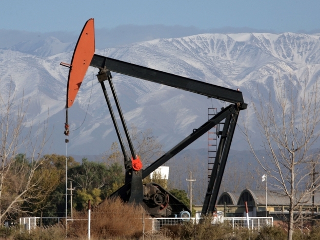 A pump extracts crude oil in western Argentina, at the foot of the Andes mountain range near the border with Chile, in 2007. The refinery is owned by the Spanish company Repsol, but Argentina's government plans to take over the company, which is complaining about the move.