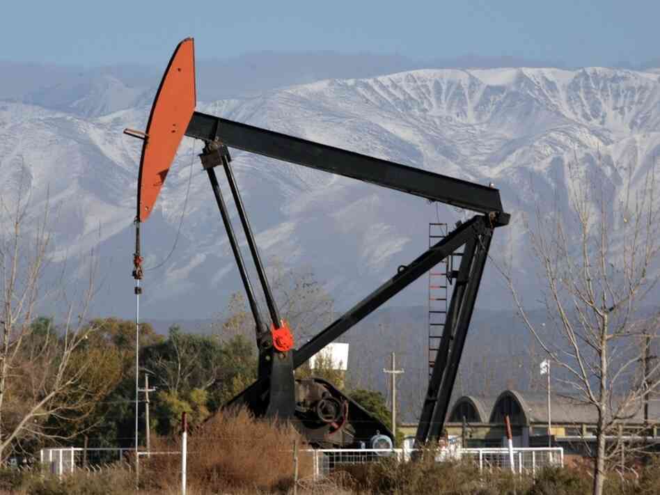 A pump extracts crude oil in western Argentina, at the foot of the Andes mountain range near the border with Chile, in 2007. The refinery is owned by the Spanish company Repsol, but Argentina's government plans to take over the company, which is complaining about the move.