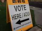 A bilingual sign announces a polling place in the 2008 general election on November 4 in Phoenix, Ariz. A bilingual sign announces a polling place in the 2008 general election on November 4 in Phoenix, Ariz.
