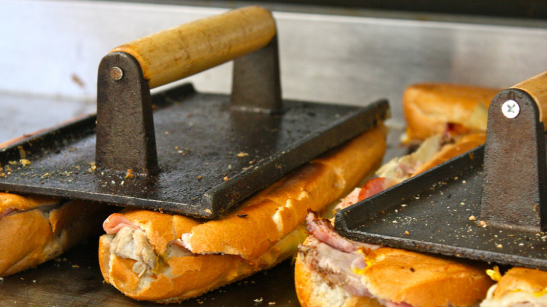Some of the sandwiches in question, getting a press on the grill