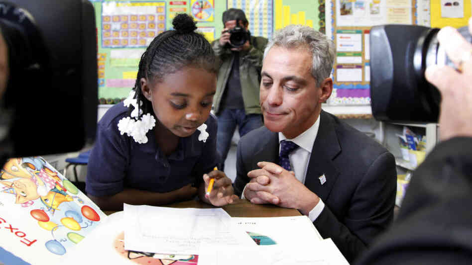 Chicago Mayor Rahm Emanuel sits with South Side first-graders in October. Emanuel's plan to lengthen the school day and the school year has met with resistance. Chicago Mayor Rahm Emanuel sits with South Side first-graders in October. Emanuel's plan to lengthen the school day and the school year has met with resistance.