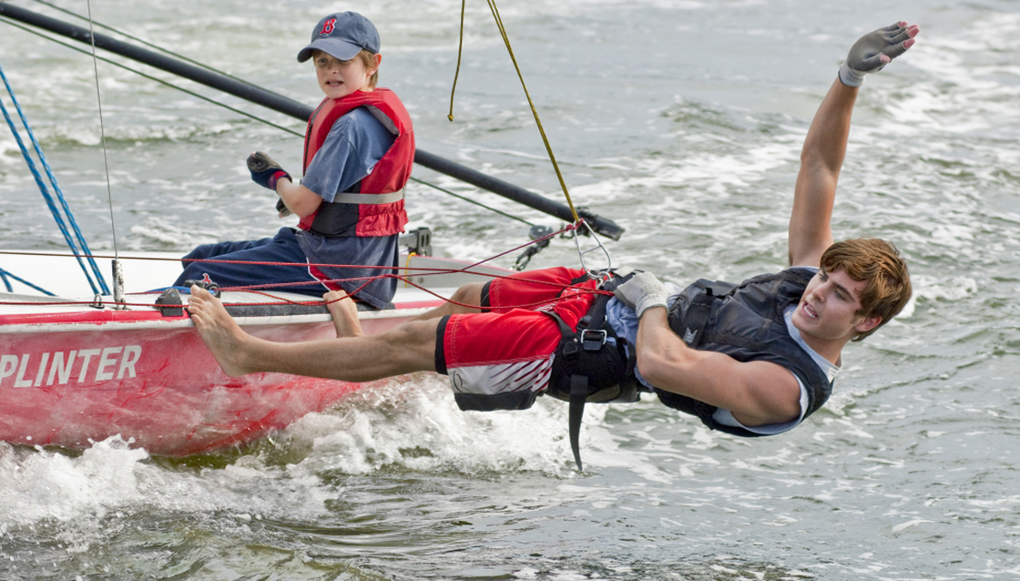 In this publicity image released by Universal Pictures, Charlie Tahan, left, and Zac Efron go sailing in Charlie St. Cloud.