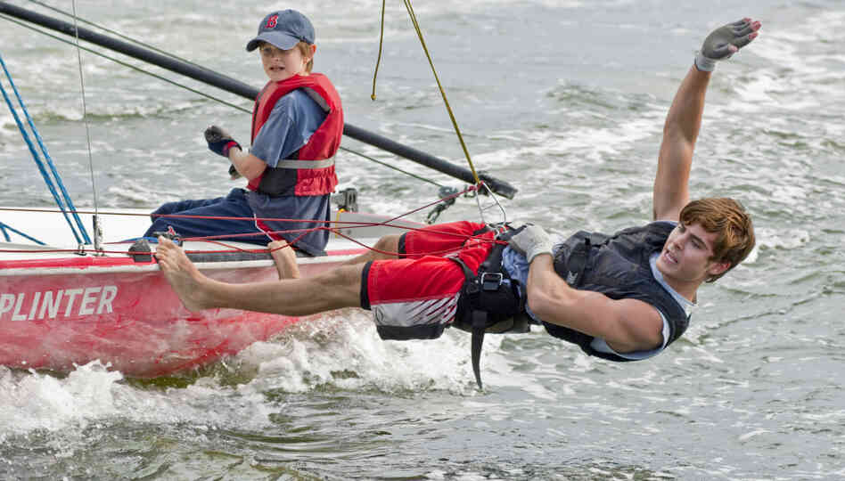In this publicity image released by Universal Pictures, Charlie Tahan, left, and Zac Efron go sailing in Charlie St. Cloud.