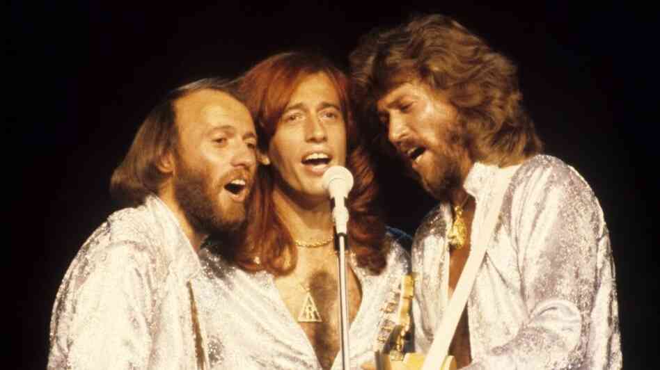 Robin Gibb (center) performs with brother Bee Gees Maurice (left) and Barry in 1979. Gibb died Sunday at the age of 62.