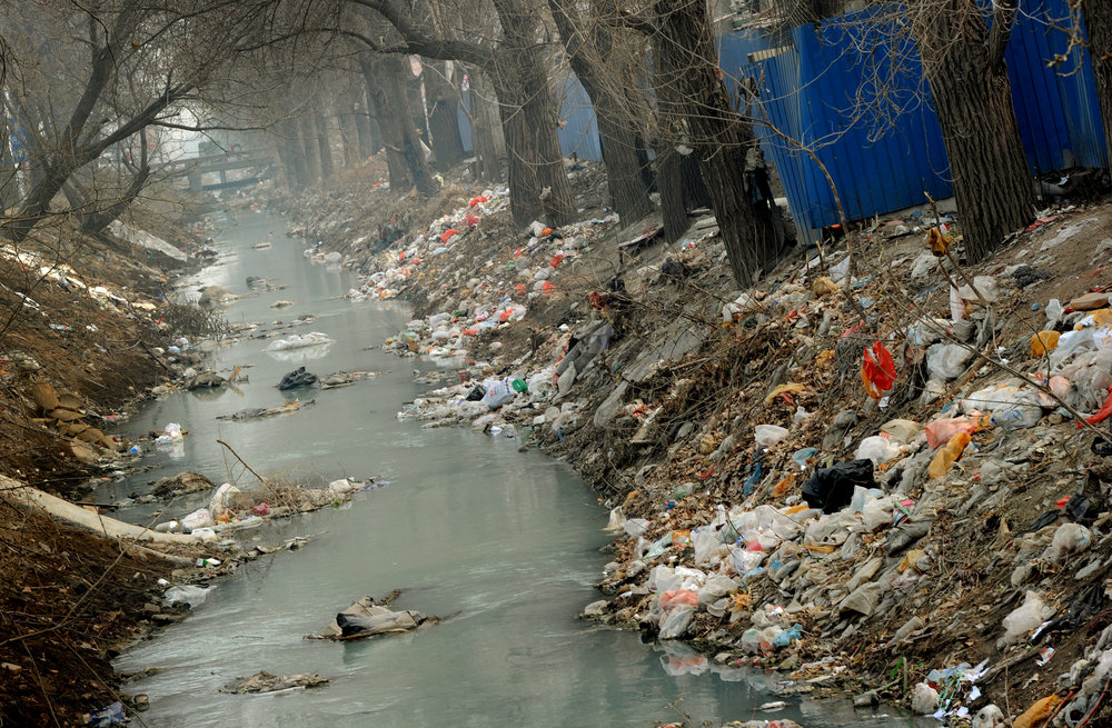 Trash clogs a canal on the edge of Beijing, China. 