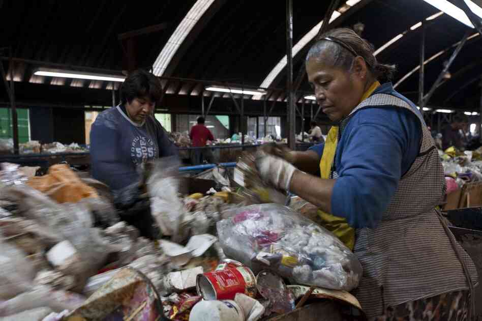 Sorters look for recyclables at the Bordo Poniente landfill on the outskirts of Mexico City, Mexico. The landfill has since been closed. 