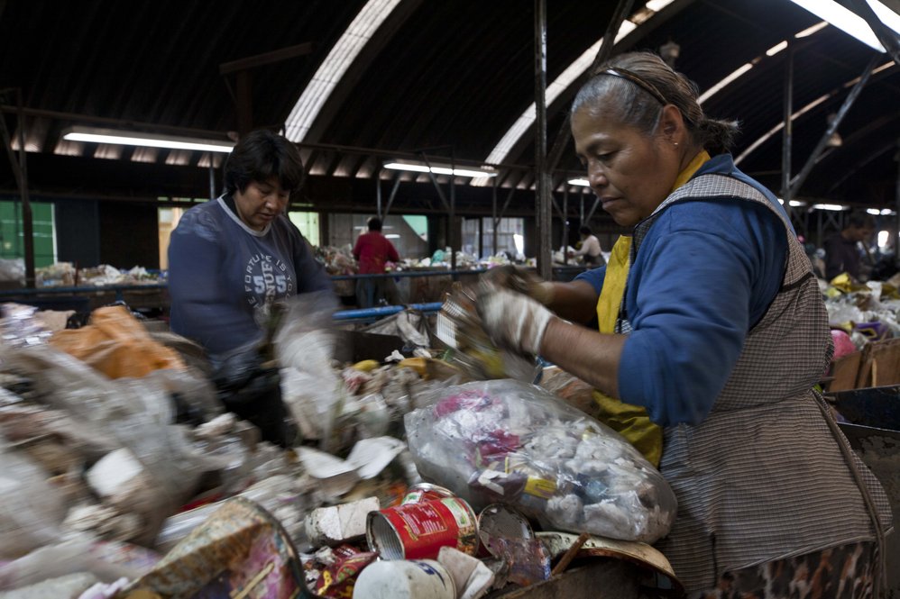 Sorters look for recyclables at the Bordo Poniente landfill on the outskirts of Mexico City, Mexico. The landfill has since been closed. 