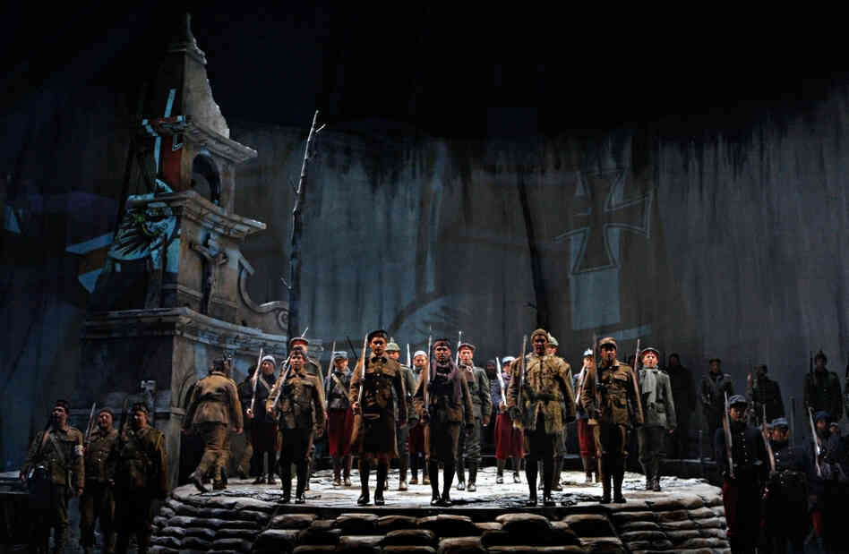 Near the beginning of the opera, it's December 23rd, 1914, and the three nationalities of soldiers in this story are lined up for a chorus — Scottish in front, French in the rear and Germans in the middle.