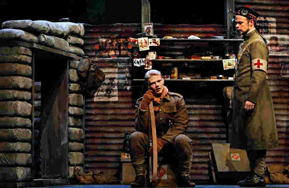 Father Palmer (Troy Cook, right) comforts Scottish soldier Jonathan Dale (John Robert Lindsey), who laments the loss of his brother in the battle.
