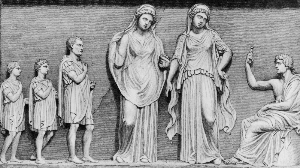 A father and his two sons consulting the oracles of Apollo at Delphi in ancient Greece, circa 600 B.C.