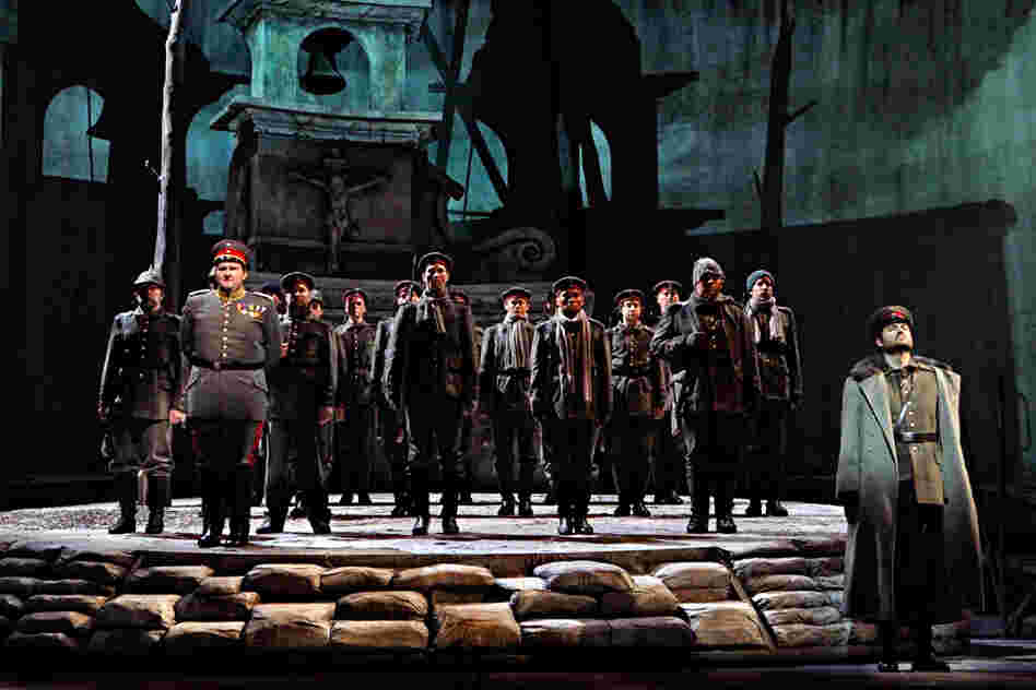 Near the end of the opera, the German soldiers — led by A. J. Glueckert as Kronprinz, son of Kaiser Wilhelm II (far right), and Craig Irvin as Lieutenant Horstmayer (left) — prepare to be shipped off to the Russian front.