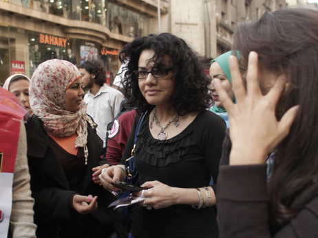 Mona Eltahawy (center), a prominent Egyptian-born, U.S.-based columnist, and Egyptian activist Samira Ibrahim (left) march in downtown Cairo to mark International Women's Day in March. Mona Eltahawy (center), a prominent Egyptian-born, U.S.-based columnist, and Egyptian activist Samira Ibrahim (left) march in downtown Cairo to mark International Women's Day in March.