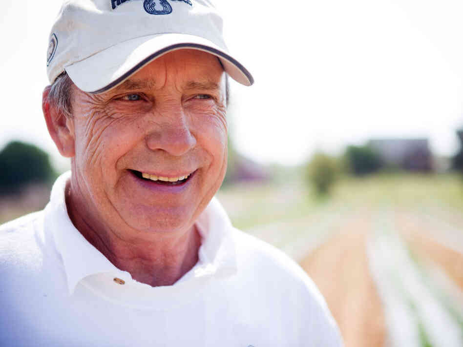 Phil Miller with this year's crop of cabbage at his farm in Clinton, Md. Phil Miller with this year's crop of cabbage at his farm in Clinton, Md.
