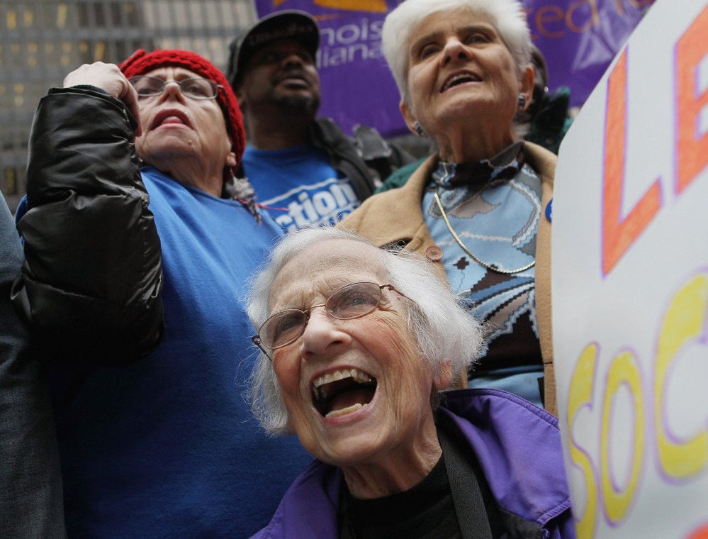 Senior citizens protest threatened cuts to Social Security and Medicare in  Chicago in November 2011.
