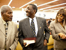 Natasha Shamone-Gilmore (right) at church with her husband, Curtis Gilmore (center), and her father, Franklin Brunson, 81. Shamone-Gilmore moved her father into her Capitol Heights, Md., home after he developed dementia. Natasha Shamone-Gilmore (right) at church with her husband, Curtis Gilmore (center), and her father, Franklin Brunson, 81. Shamone-Gilmore moved her father into her Capitol Heights, Md., home after he developed dementia.