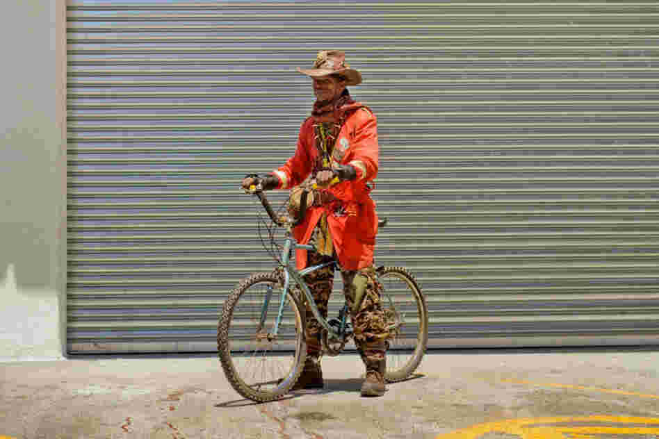Asher Tafara: "I travel with the bike to get some herbs and medicines on the mountains. I do healing of the people and selling medicines for a living."