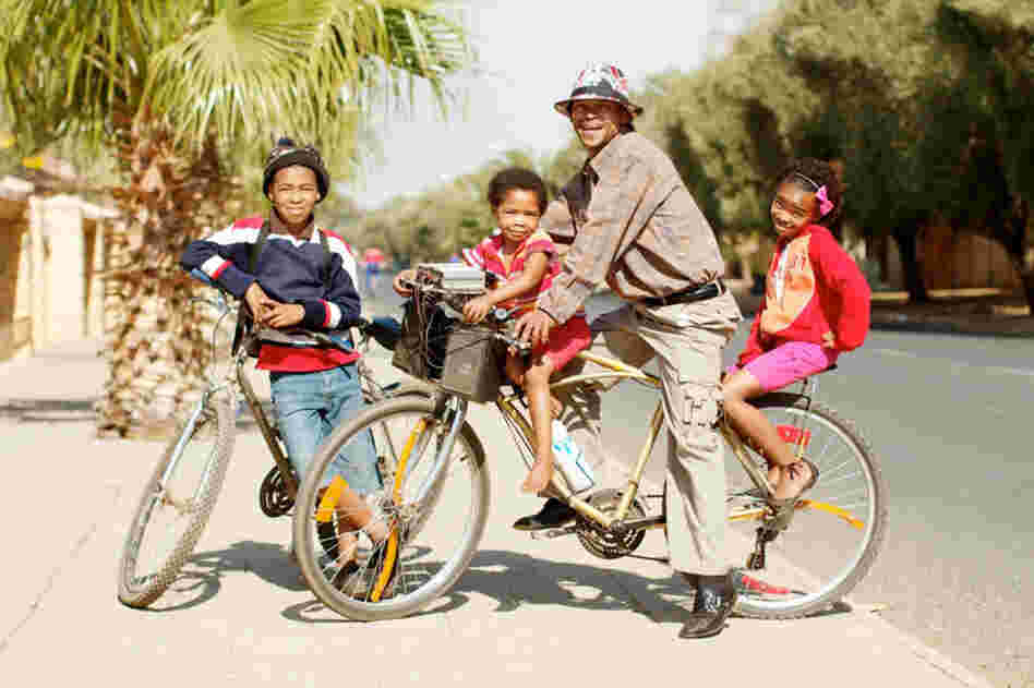 Johannes van Wyk with Chris, Danisha and Sarie: "At our home we fix bicycles, and our dad always used to ride and all those type of things, so we also made it a part of us. It is very important to us."
