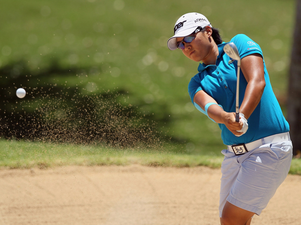 Yani Tseng of Taiwan hits a bunker shot to the ninth green during the second round of the LPGA LOTTE Championship at the Ko Olina Golf Club in Kapolei, Hawaii.