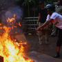Local officials burn chicken coops in anticipation of a resurgence in bird flu in Jakarta, Indonesia, in January. Concerns about potential misuse of research into genes that control the contagiousness of flu have stymied publication.